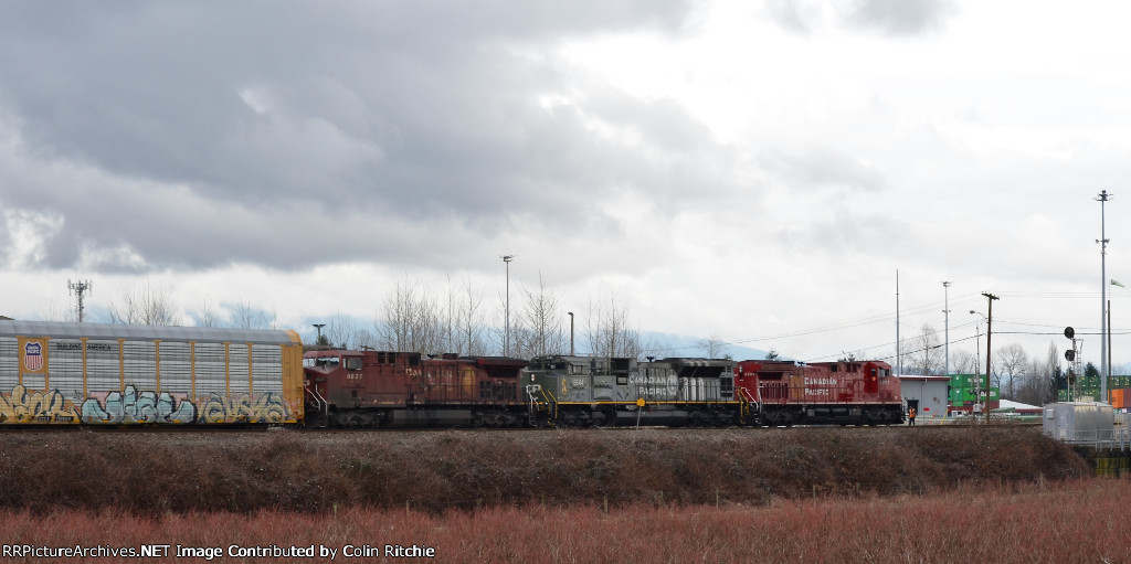 CP 8201, 6644 and 8637 stopped short of the Kennedy Road crossing E/B, prior to entering the PoCo Intermodal Yard.